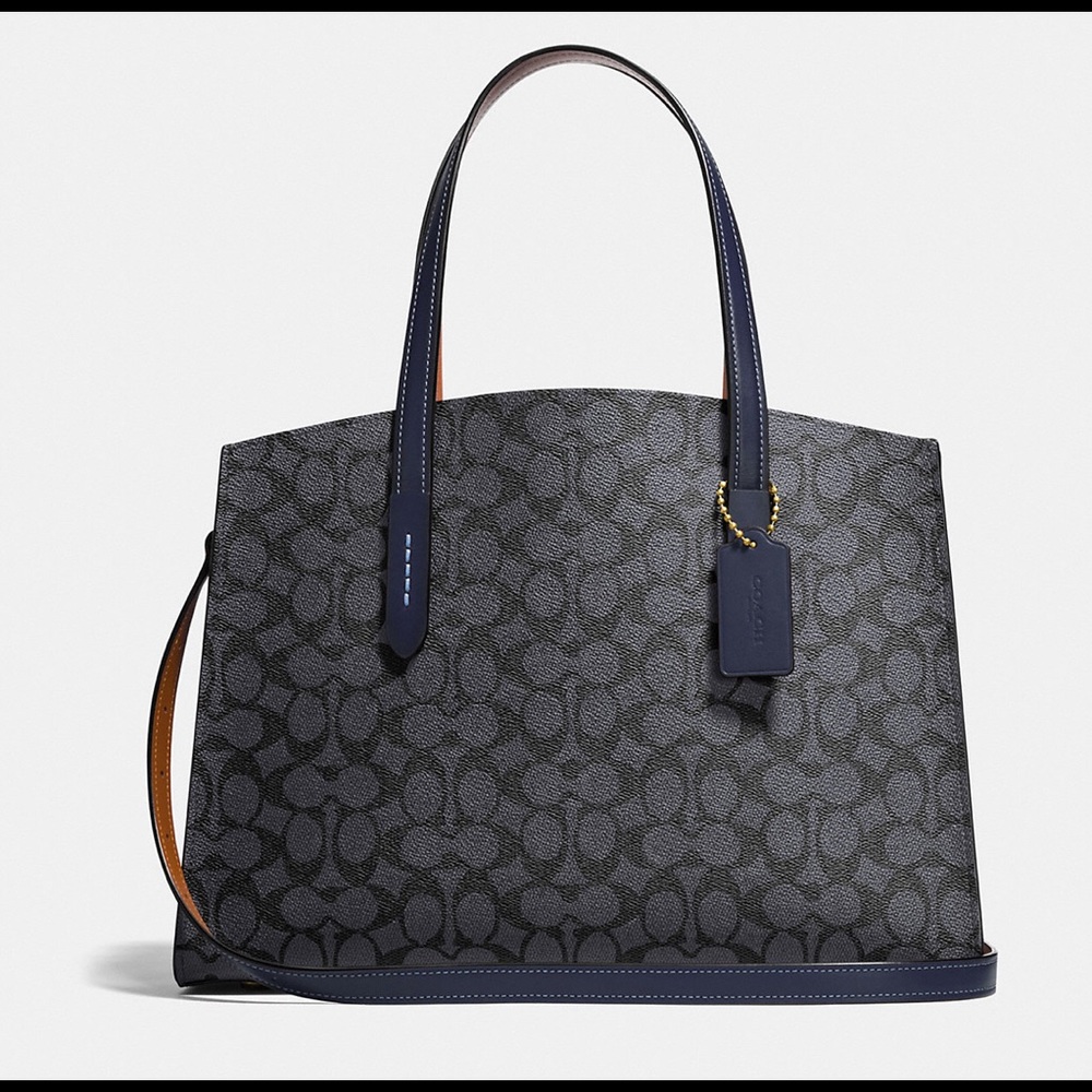 Coach Charlie carryall in Signature Canvas